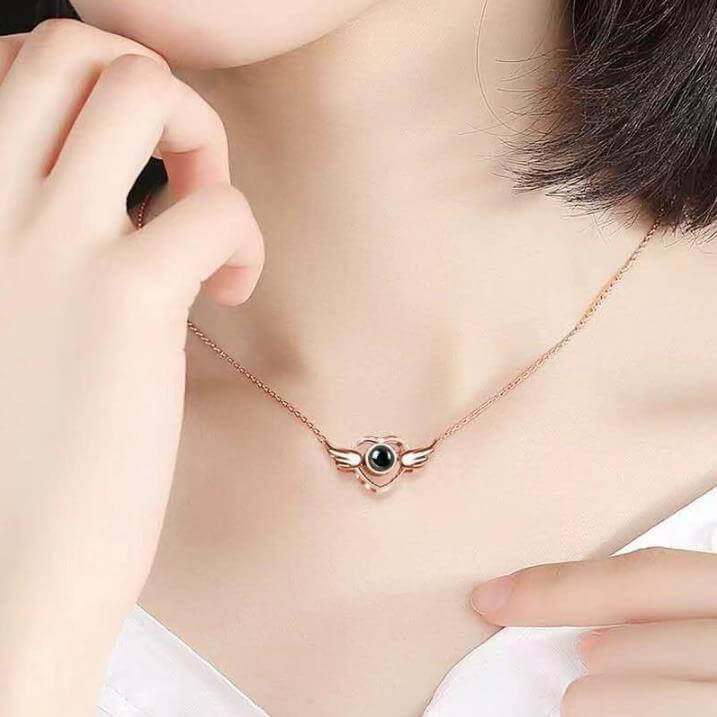 Heart and Wings Necklace with I Love You in 100 La